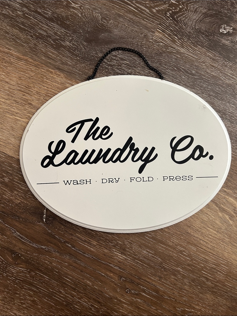 The Laundry Co. Oval Wall Sign in White and Black